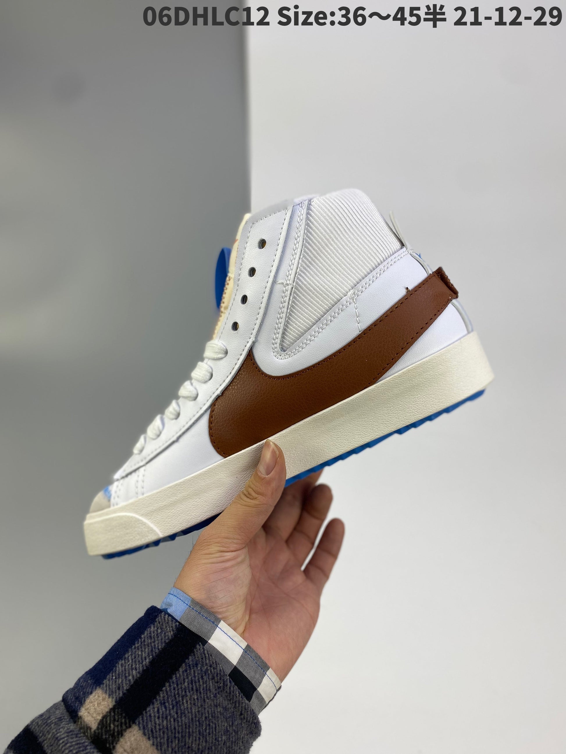 Nike Blazer Mid'1977 Vintage - White Unisex Streetwear Limited Edition - The Nike Blazer Mid '1977 Vintage in Brown brings a refined, earthy tone to the