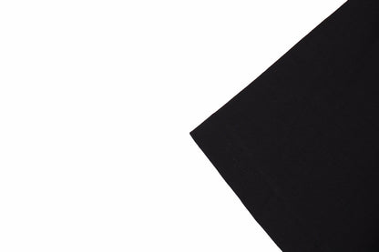 Camiseta negra con logo en spray de Balenciaga