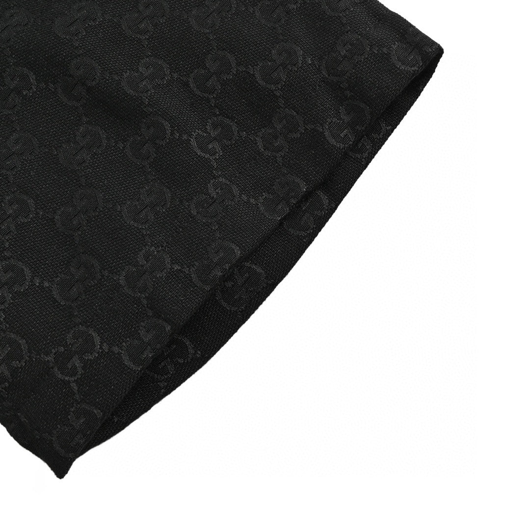 Camisa negra de manga corta con monograma GG de Gucci