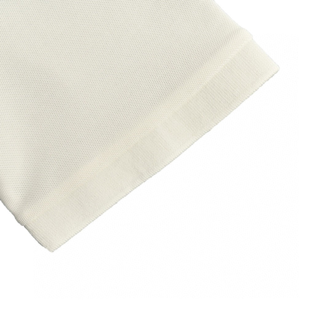 Prada Classic White Polo Shirt - close up - replica sneakers