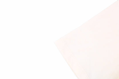 Camiseta Gucci con logo de rayo en color crema