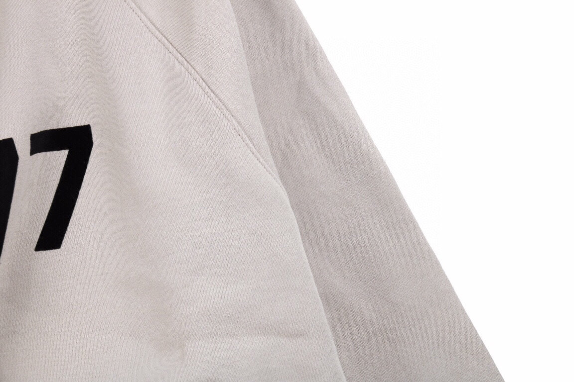 Fear of God Essentials '1977' Sweatshirt - close up - replica sneakers