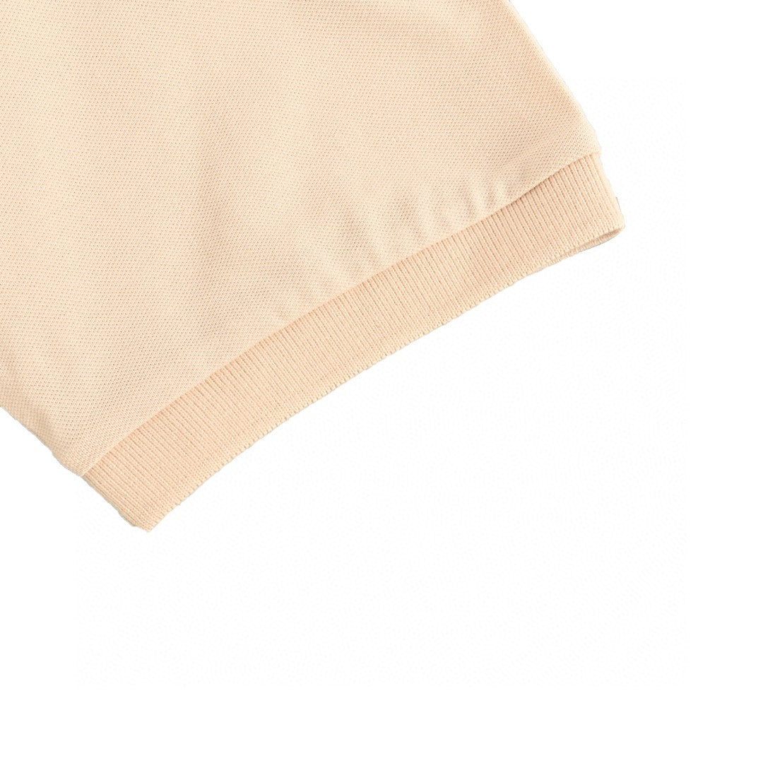 Prada Logo Patch Beige Polo Shirt - close up - replica sneakers