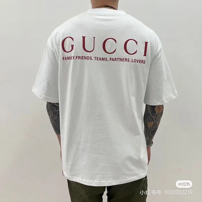 Gucci Ancor. T-shirt (white) Unisex Streetwear Limited Edition - <span>Stylish white t-shirt featuring a red 'GUCCI ANCOR.' graphic with event details on the chest.