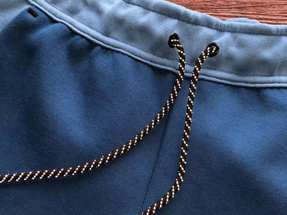 NIKE Tech Fleece Pants - Dutch - Court - Blue Unisex Streetwear Limited Edition - The NIKE TECH FLEECE PANTS DUTCH BLUE/COURT BLUE - REPLICA offer the perfect fusion of