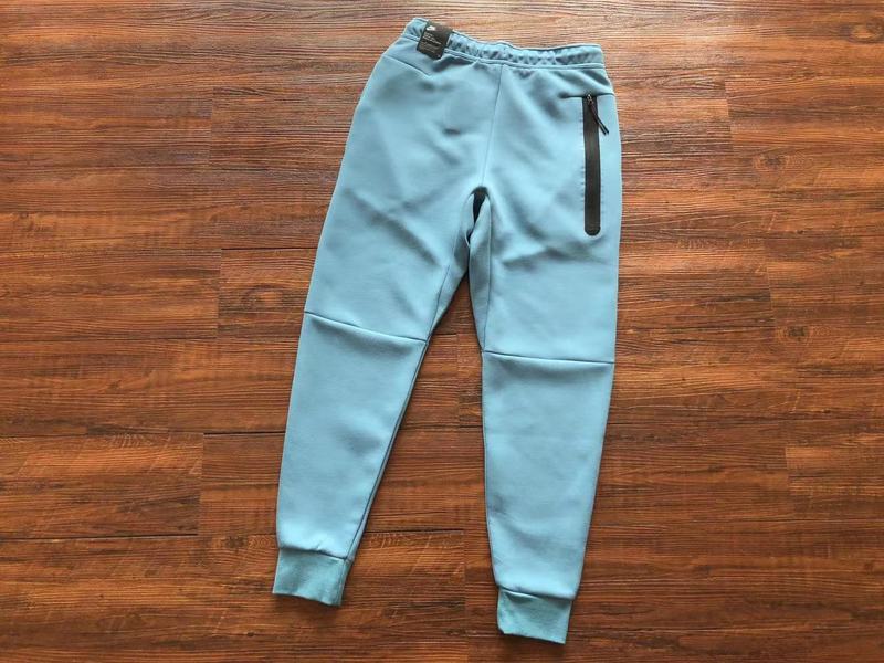 NIKE Tech Fleece Pants - Baby - Blue Unisex Streetwear Limited Edition - The NIKE TECH FLEECE PANTS BABY BLUE - REPLICA combine modern athletic innovation with sleek