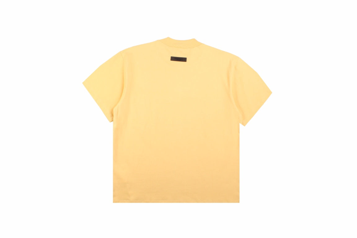 Fear Of God Essentials T-shirt - Yellow Unisex Streetwear Limited Edition - <p dir='ltr'><span>This Fear of God Essentials t-shirt features a clean, minimalist design in a