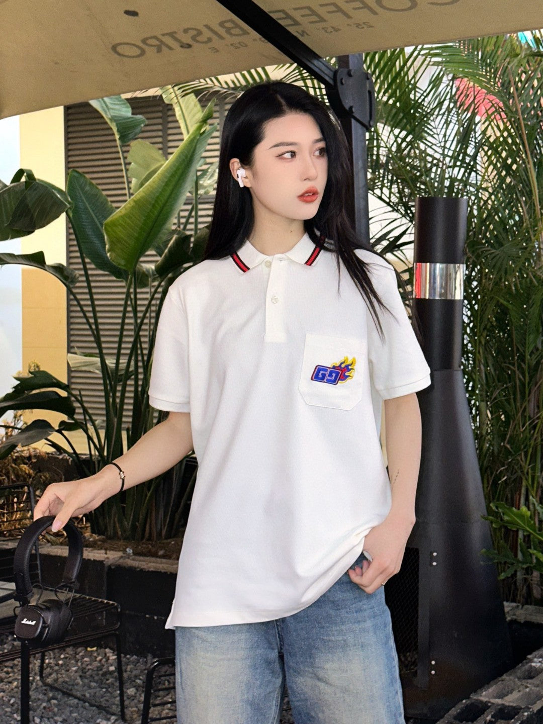Gucci Flame Logo Polo Shirt - Black Unisex Streetwear Limited Edition - <span>This Gucci polo shirt features a stylish cream color with unique design elements. It includes