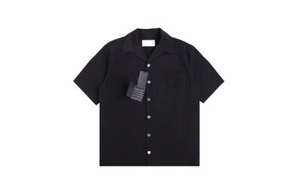 Prada Short-sleeve Button-up Shirt - Black Unisex Streetwear Limited Edition - <p dir='ltr'><span>Black short-sleeve button-up shirt with a subtle checkered pattern. Features a front pocket