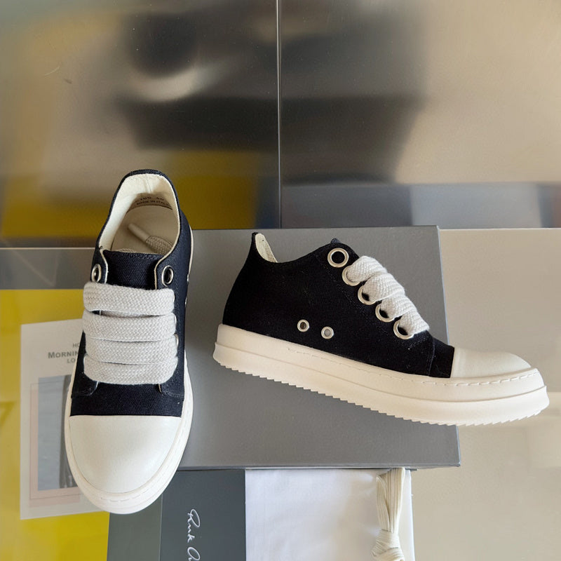 Rick Owens Canvas Low-top Sneakers - Black Unisex Streetwear Limited Edition - **Rick Owens Black Canvas Low-Top Sneakers: Modern Minimalism with Superior Craftsmanship** Introducing the Rick Owens
