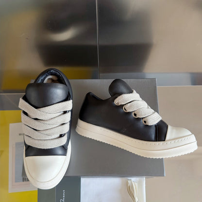 Rick Owens And White Low-top Sneakers - Black Unisex Streetwear Limited Edition - **Rick Owens Black and White Low-Top Sneakers: Modern Elegance and Superior Craftsmanship** Introducing the Rick