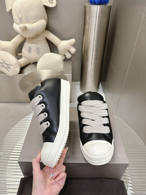 Rick Owens Low-top Sneakers - Black Unisex Streetwear Limited Edition - **Rick Owens Black Low-Top Sneakers: Avant-Garde Elegance and Comfort** Step into the future of fashion