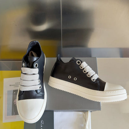 Rick Owens Low-top Sneakers - Black Unisex Streetwear Limited Edition - **Rick Owens Black Low-Top Sneakers: Modern Elegance and Superior Craftsmanship** Introducing the Rick Owens Black
