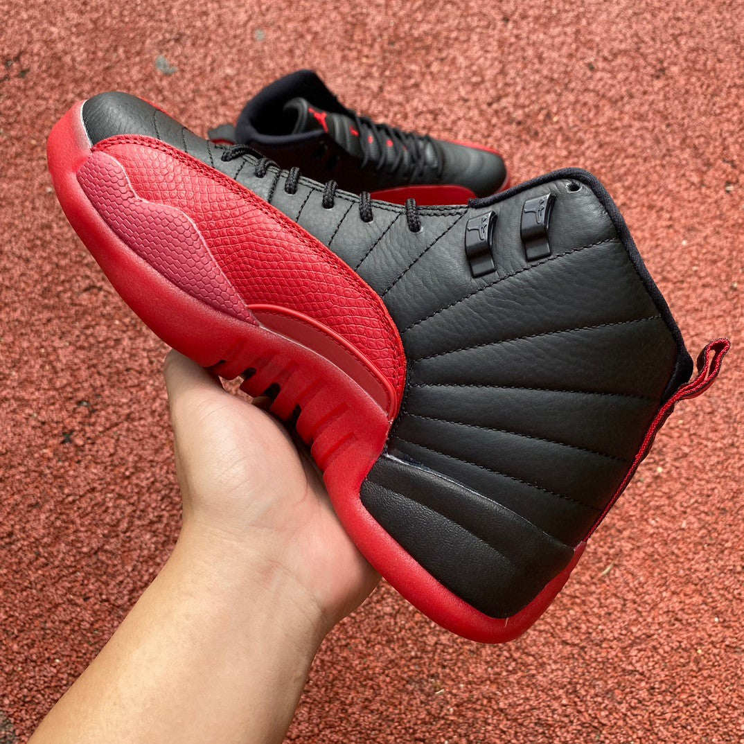 Jordan 12 Flu Game - Black Unisex Streetwear Limited Edition - Introducing the Air Jordan 12 Retro in a striking black and red colorway, a timeless