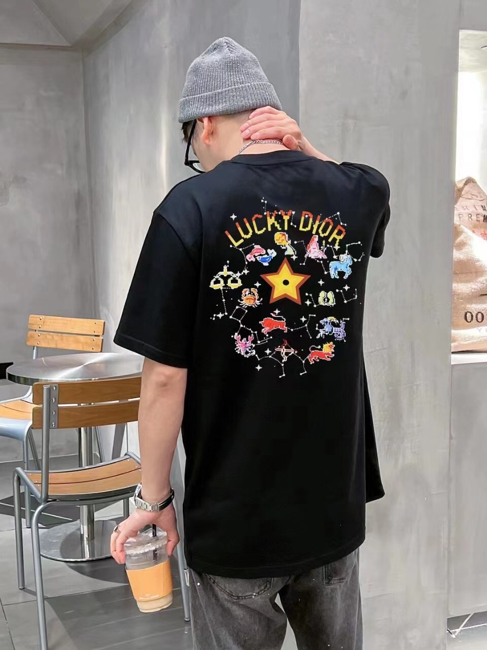 Dior Gradient Logo T-shirt - Black Unisex Streetwear Limited Edition - <p dir='ltr'><span>Black t-shirt featuring a distinctive 'DIOR' logo in a gradient color scheme on