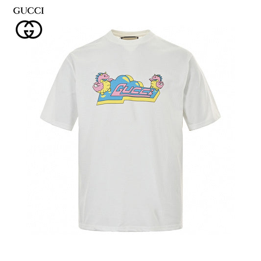 Gucci T-shirt With Pink Dinosaur Graphic - White Unisex Streetwear Limited Edition - <span>Fun and trendy. Features colorful pink dinosaur cartoons. Gucci logo in the center. Made from