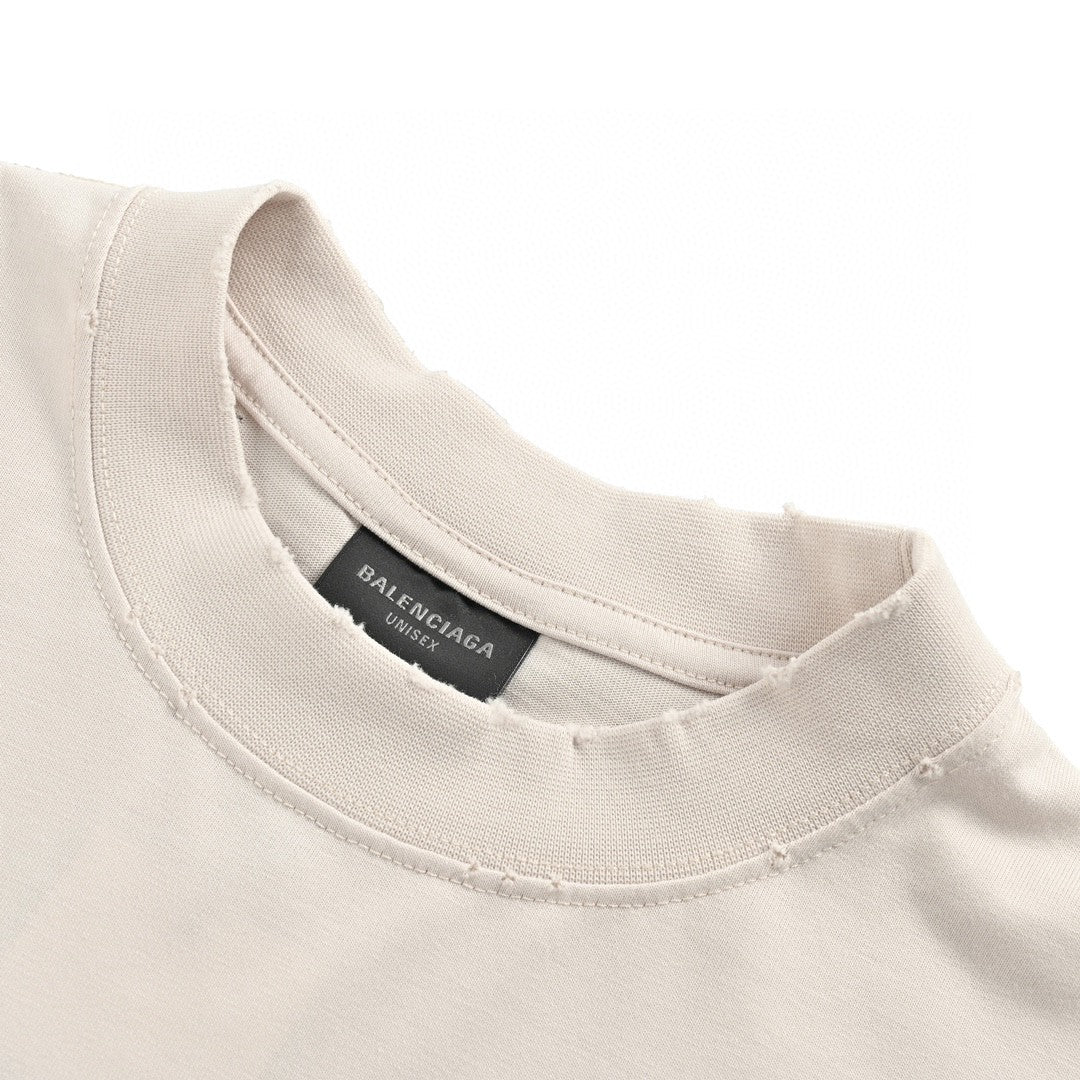 Camiseta beige con logo estampado de Balenciaga