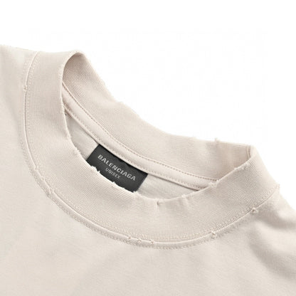 Camiseta beige con logo estampado de Balenciaga