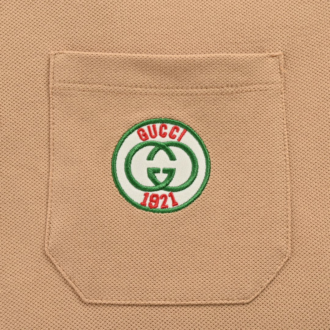 Gucci Stripe Sleeve Polo Shirt - White Unisex Streetwear Limited Edition - <span>This Gucci polo shirt features a sophisticated beige color with signature green and red stripes