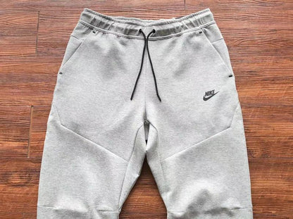 NIKE Tech Fleece Pants - - Grey Unisex Streetwear Limited Edition - The NIKE TECH FLEECE PANTS GREY - REPLICA deliver the perfect combination of modern athletic