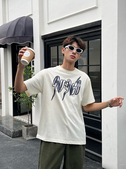 Camiseta color crema con gráfico de Gucci