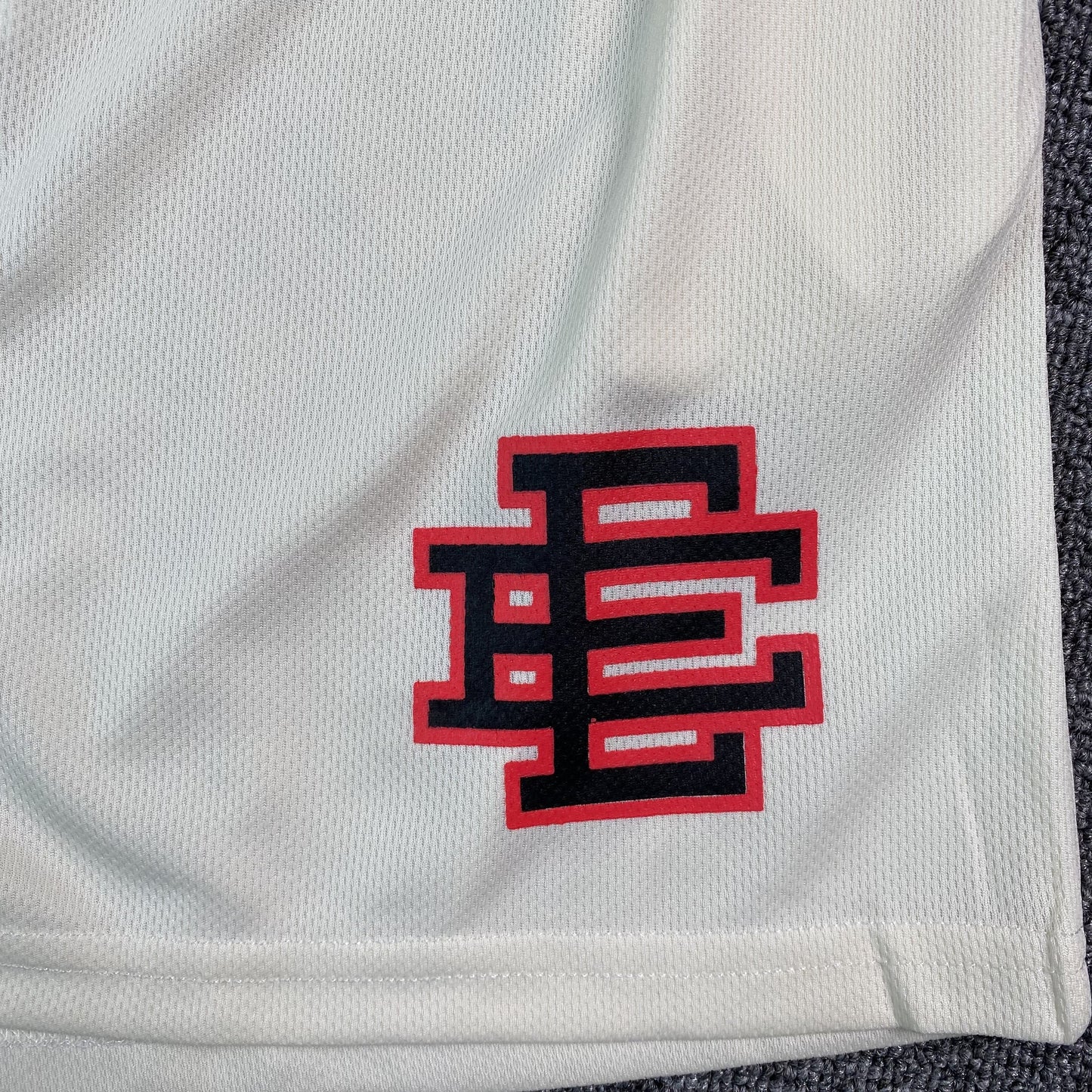 ERIC Emanuel Ee Basic Shorts Cream - - Red - Black Unisex Streetwear Limited Edition - The ERIC EMANUEL EE BASIC SHORTS CREAM/BLACK/RED - REPLICA bring together luxury streetwear aesthetics and