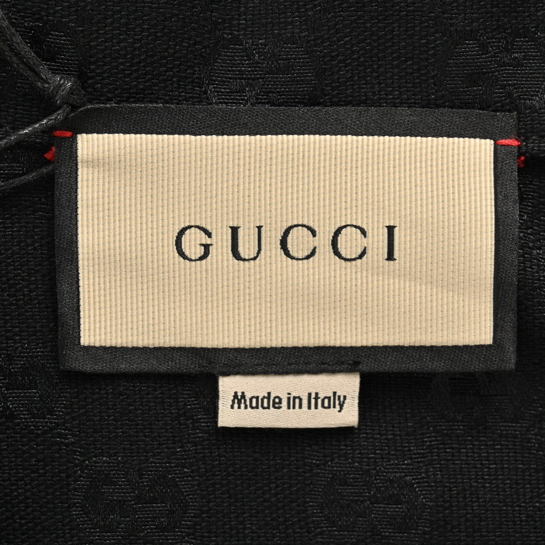 Camisa negra de manga corta con monograma GG de Gucci