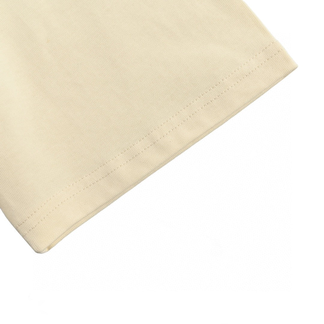 Camiseta con logo vintage de Gucci (color crema)