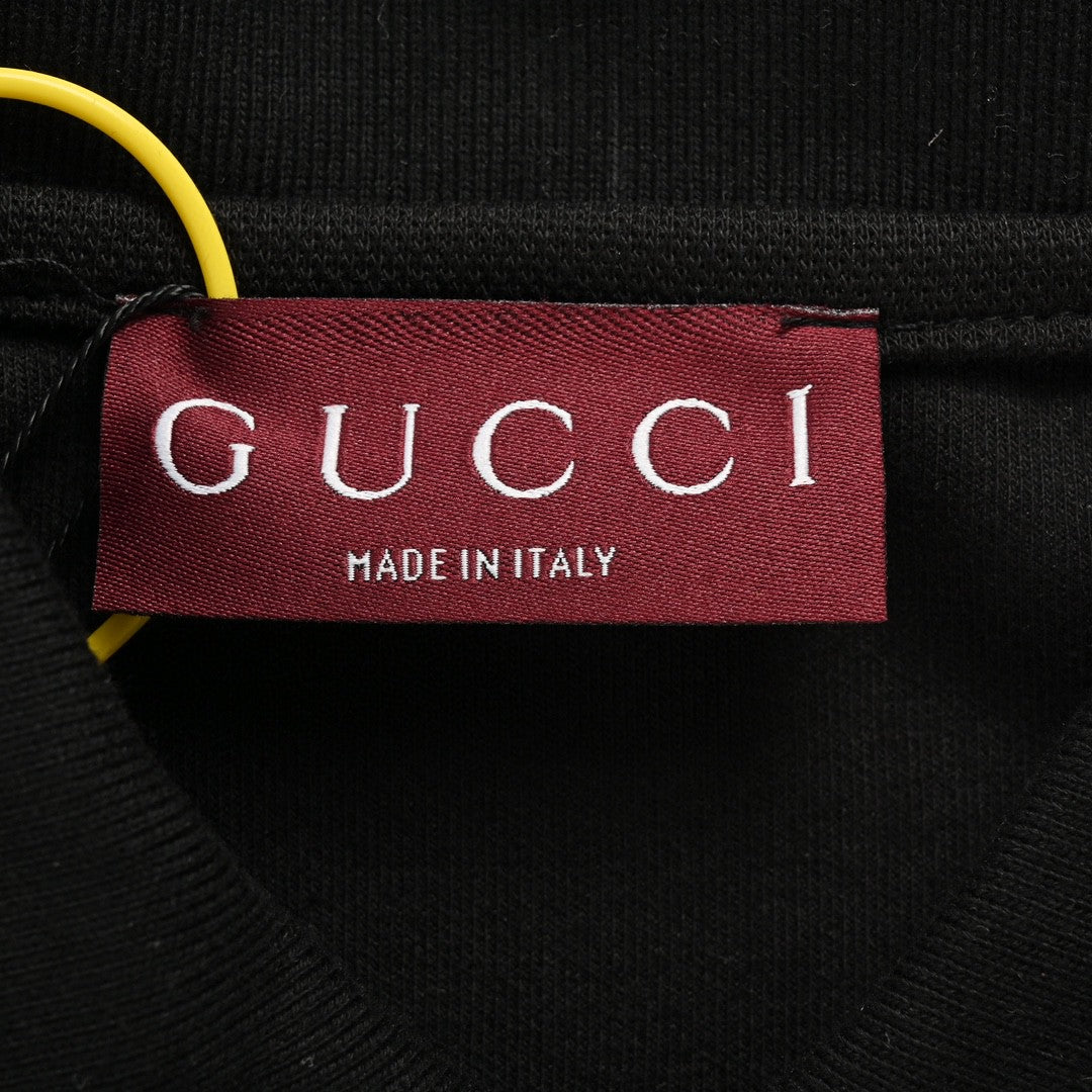 Polo à logo rayé Gucci (noir)