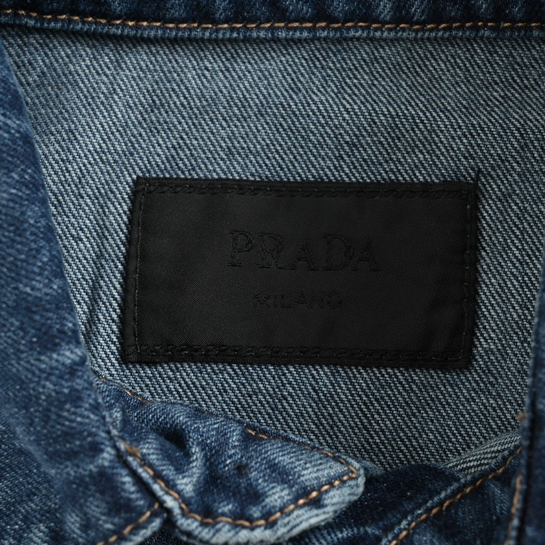 Prada Denim Shirt - Blue Unisex Streetwear Limited Edition - This Prada denim shirt features a classic blue wash design. It has short sleeves and