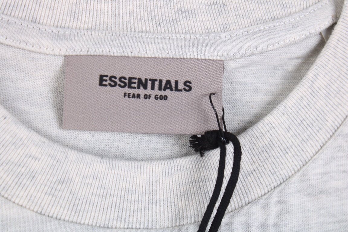 Camiseta con el logo de Fear of God Essentials - Gris jaspeado