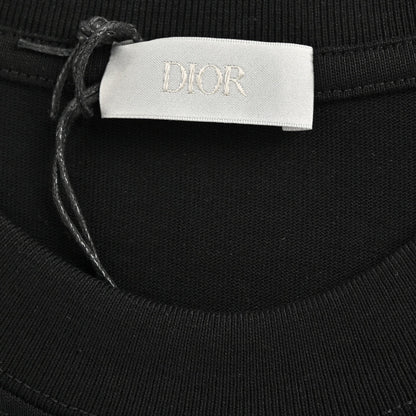 Camiseta Dior con logo graffiti en negro