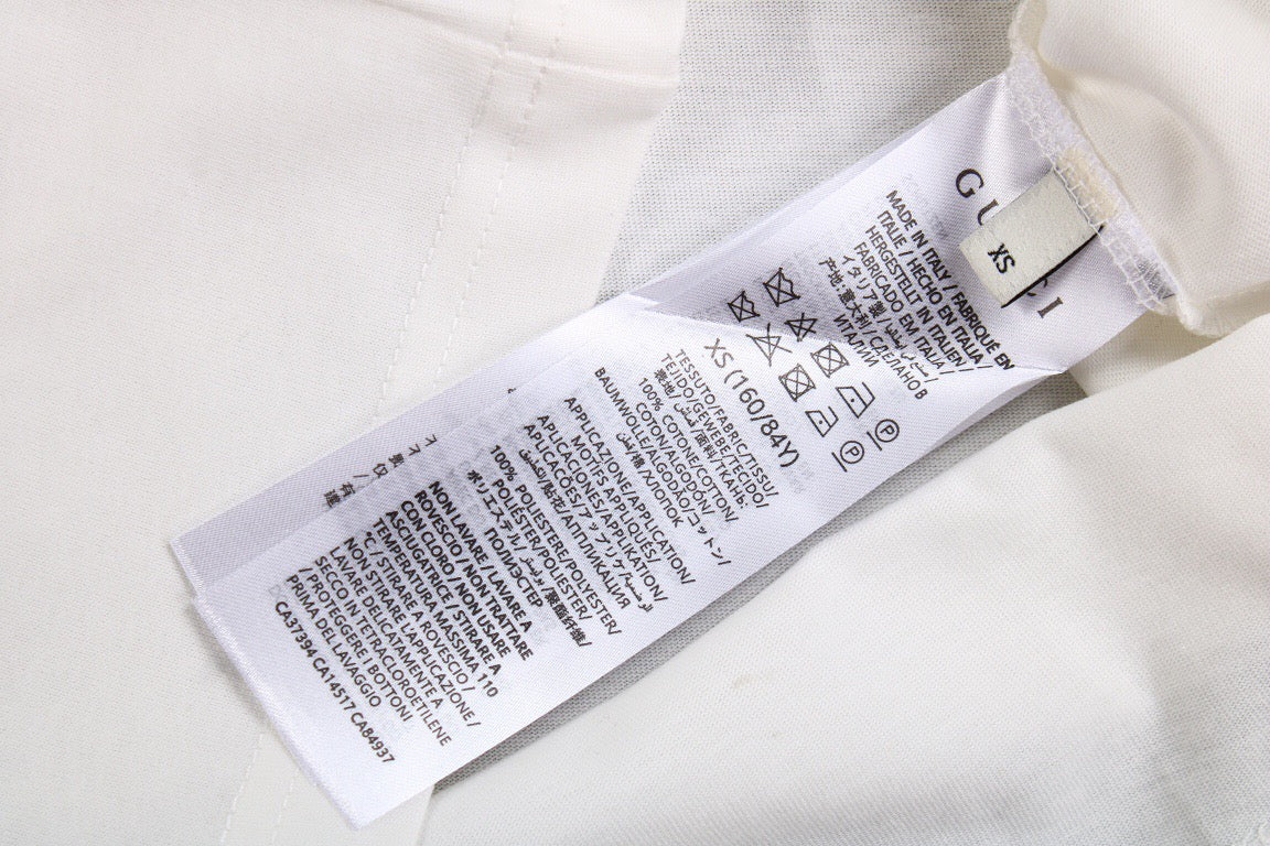 Camiseta Gucci con ciudades bordadas