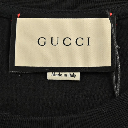 Gucci T-shirt With Pink Dinosaur Graphic - Black Unisex Streetwear Limited Edition - <span>Fun and trendy. Features colorful pink dinosaur cartoons. Gucci logo in the center. Made from