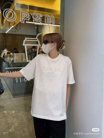 Prada T-shirt - With Subtle Branding - White Unisex Streetwear Limited Edition - <span>This Prada t-shirt features a clean white base with subtle 'PRADA MILANO' branding across the