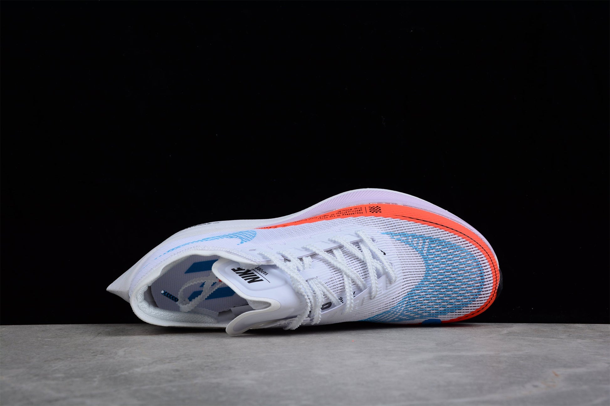 Zoom - Vaporfly Ne - T% 2 And Orange - White Unisex Streetwear Limited Edition - The Nike ZoomX Vaporfly NEXT% 2 is a high-performance running shoe designed for elite runners.