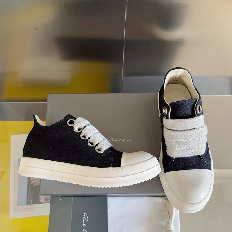 Rick Owens Canvas Low-top Sneakers - Black Unisex Streetwear Limited Edition - **Rick Owens Black Canvas Low-Top Sneakers: Modern Minimalism with Superior Craftsmanship** Introducing the Rick Owens