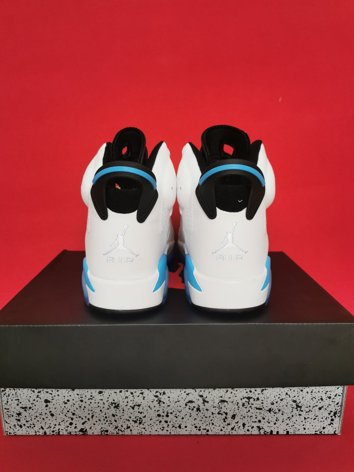 Jordan 6 And Blue - White Unisex Streetwear Limited Edition - The Air Jordan 6 showcased in this image is a striking blend of classic design