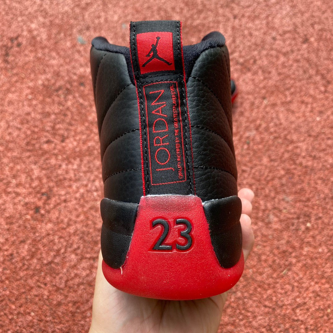 Jordan 12 Flu Game - Black Unisex Streetwear Limited Edition - Introducing the Air Jordan 12 Retro in a striking black and red colorway, a timeless