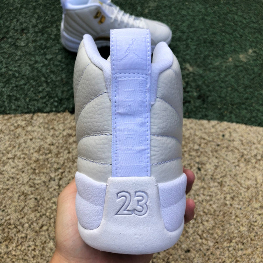 Jordan 12 Ovo - White Unisex Streetwear Limited Edition - Introducing the Air Jordan 12 Retro 'Royalty' edition, a luxurious take on a classic silhouette.