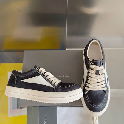 Rick Owens Canvas Low-top Sneakers - Black Unisex Streetwear Limited Edition - **Rick Owens Black Canvas Low-Top Sneakers: Modern Minimalism and Superior Craftsmanship** Introducing the Rick Owens