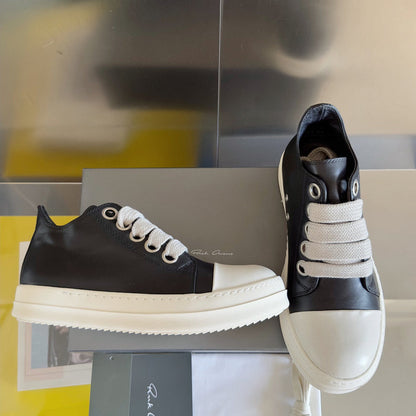 Rick Owens Low-top Sneakers - Black Unisex Streetwear Limited Edition - **Rick Owens Black Low-Top Sneakers: Modern Elegance and Superior Craftsmanship** Introducing the Rick Owens Black