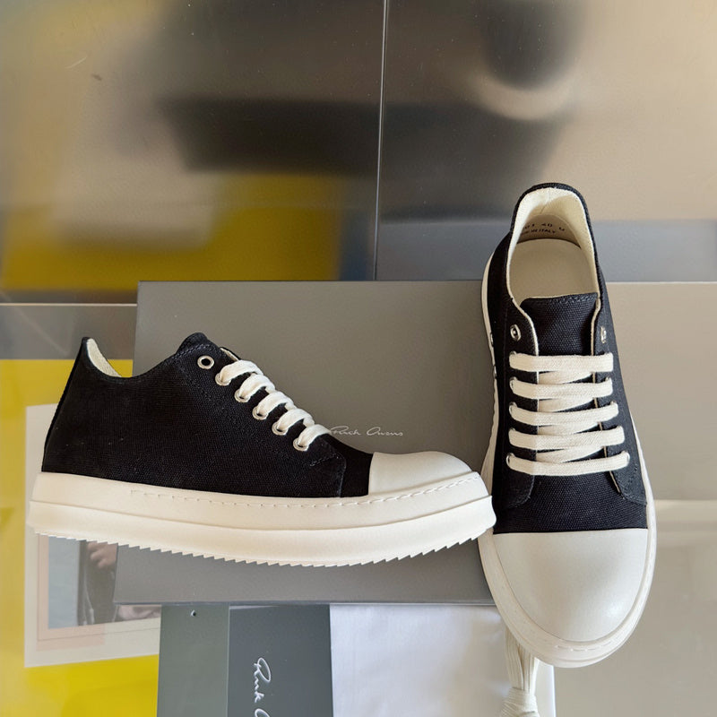 Rick Owens Low-top Sneakers - Black Unisex Streetwear Limited Edition - **Rick Owens Black Low-Top Sneakers: Timeless Elegance and Modern Craftsmanship** Introducing the Rick Owens Black