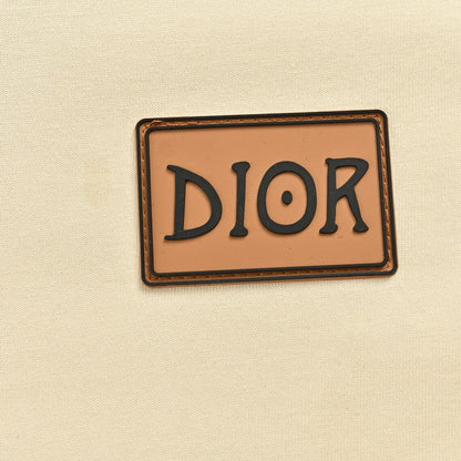 Camiseta Dior color crema con ribete negro