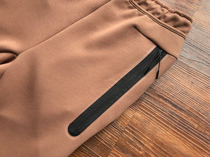 PANTALONES NIKE TECH FLEECE x MARRÓN ARQUEO