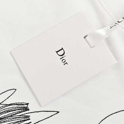 Camiseta Dior con diseño de garabatos