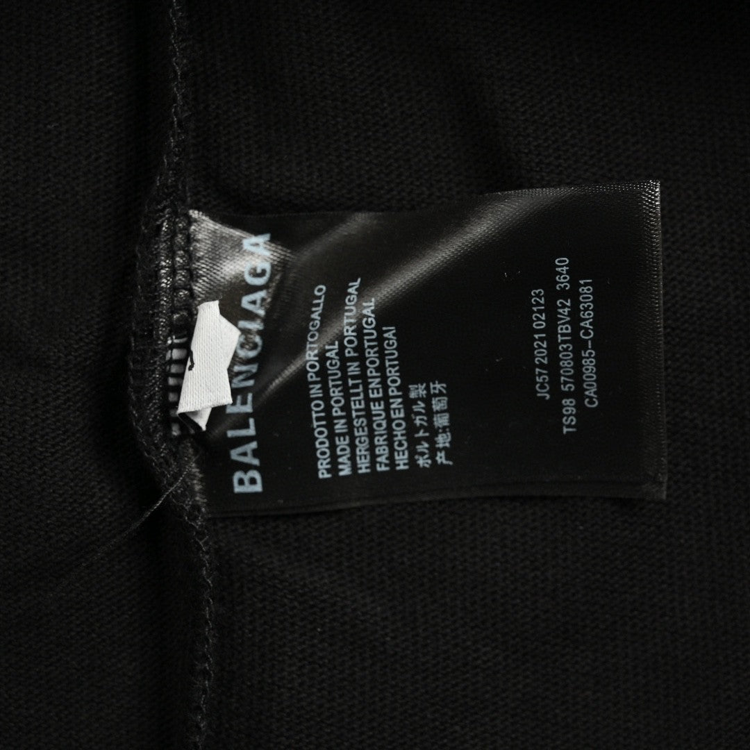 T-shirt noir Balenciaga Society avec motif blanc.