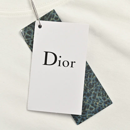 Camiseta Dior blanca y marrón