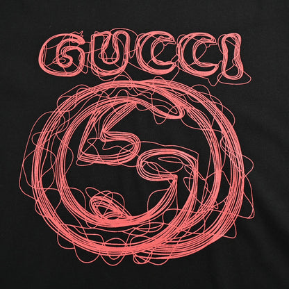 Gucci T-shirt - Scribble Logo - Black Unisex Streetwear Limited Edition - <span>This Gucci t-shirt features a distinctive design with the iconic Gucci logo in a scribble