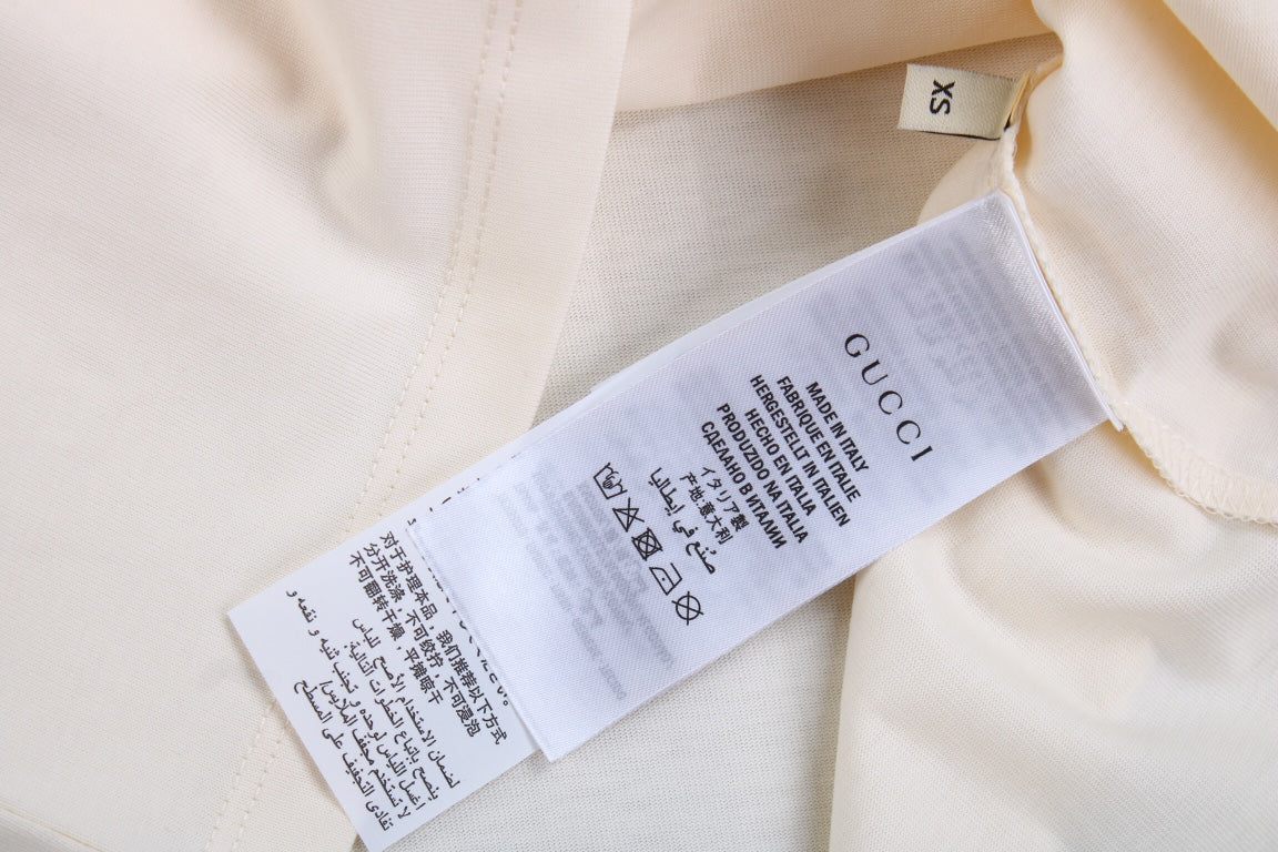 Camiseta Gucci con estampado de setas (Crema)